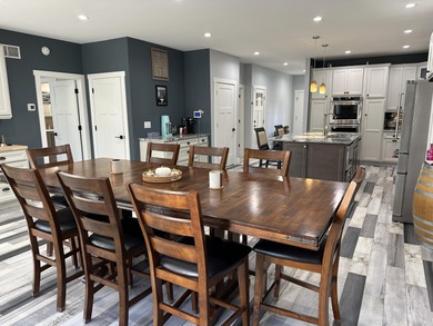 This home overlooks the pristine Lake Michigan Hills Golf Course - photo 16