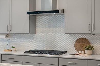 Thoughtfully designed & upgraded throughout, this home impresses - photo 18