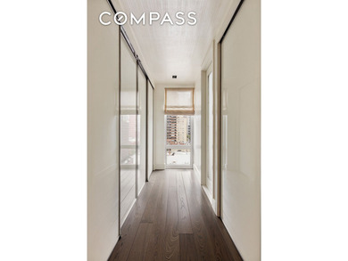 Perched high above the city, this exceptional full-floor - photo 21