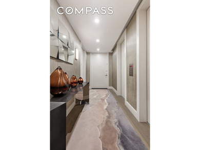 Perched high above the city, this exceptional full-floor - photo 24