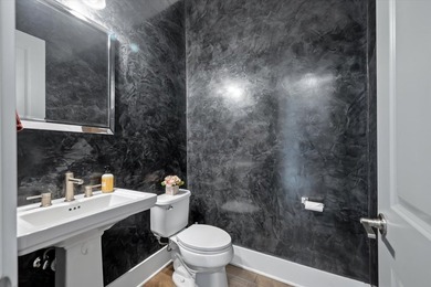 Thoughtfully designed & upgraded throughout, this home impresses - photo 37