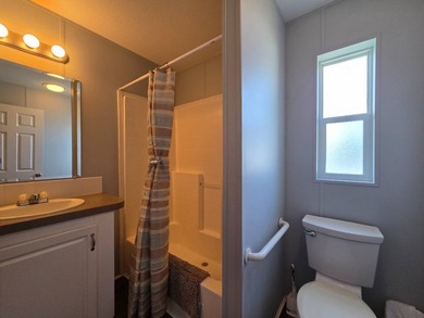 This 2 bed 2 bath 2012 home is located in Teakwood Village a 5 - photo 11