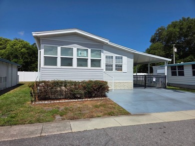 This 2 bed 2 bath 2012 home is located in Teakwood Village a 5 - photo 15