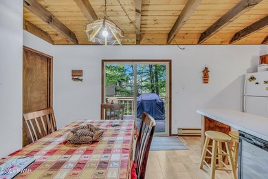 Surrounded by trees in The Hideout, a premier four-season - photo 4