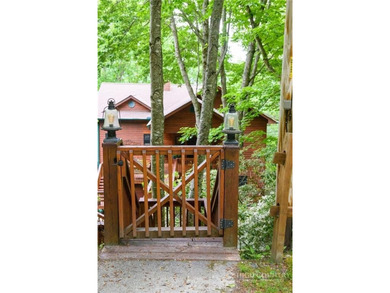 Magnificent home embraced by rhododendrons and hardwood trees - photo 8