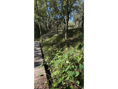 **Prime Canal-Front Lot - Perfect for Your Dream Home** Nestled - photo 5