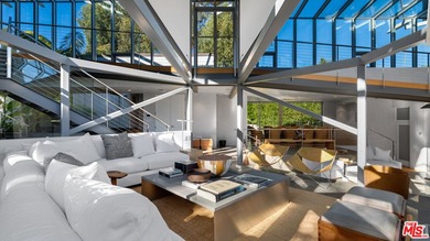 Ocean views, lush natural light, and dramatic angles animate the - photo 12