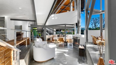 Ocean views, lush natural light, and dramatic angles animate the - photo 13