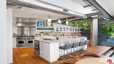 Ocean views, lush natural light, and dramatic angles animate the - photo 19