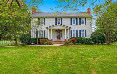 Charming plantation style home situated on over an acre of land - photo 1