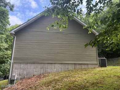 PRICED to SELL. This raised ranch is on 1.08 acres and has 3 - photo 6