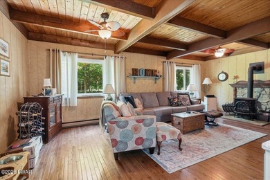 Welcome to this spacious 4-bedroom, 2-bath home nestled in the - photo 3