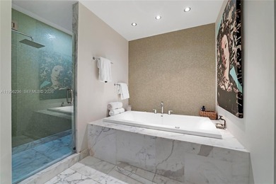 Unobstructed Miami skyline vistas await in this stunning