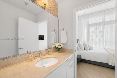 Unobstructed Miami skyline vistas await in this stunning