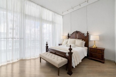 Unobstructed Miami skyline vistas await in this stunning