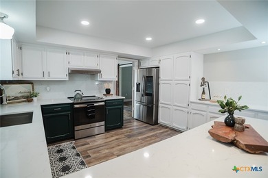 PRICE IMPROVEMENT - Recently Reduced $25,000! Experience the - photo 11