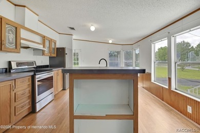 This nice spacious mobile home offers a well designed floor plan - photo 12