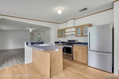 This nice spacious mobile home offers a well designed floor plan - photo 13