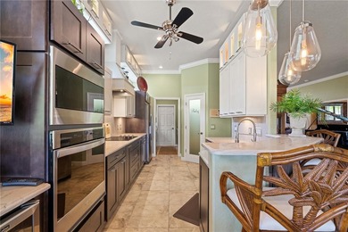 SEMINOLE LAKES GOLF COURSE HOME W/EXTENSIVE UPDATES & ENCLOSED - photo 31