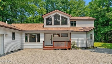 Mountain Contemporary on a Double Lot in Hemlock Farms! Nestled - photo 3