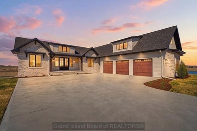 Experience elevated lake living in this stunning new Oseka home - photo 1