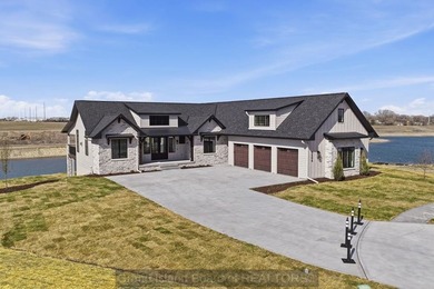 Experience elevated lake living in this stunning new Oseka home - photo 3