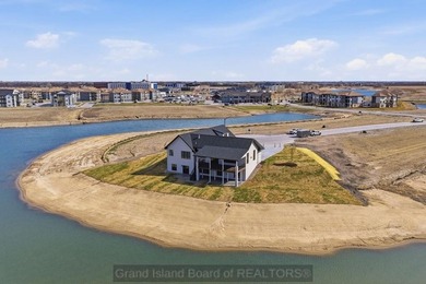 Experience elevated lake living in this stunning new Oseka home - photo 6