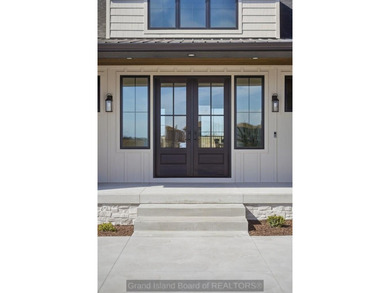 Experience elevated lake living in this stunning new Oseka home - photo 7