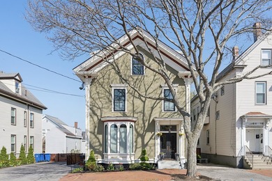 This redesigned downtown three-unit is a rare gem--where - photo 1