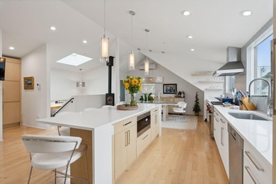 This redesigned downtown three-unit is a rare gem--where - photo 8