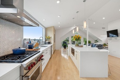 This redesigned downtown three-unit is a rare gem--where - photo 10