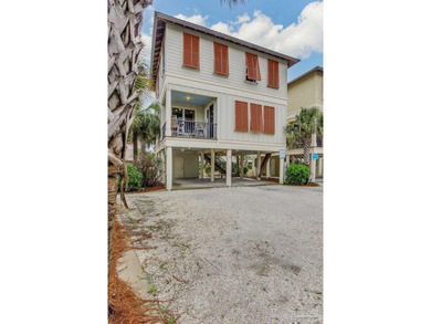 Welcome to your Gulf Coast oasis! This charming beach cottage in - photo 1