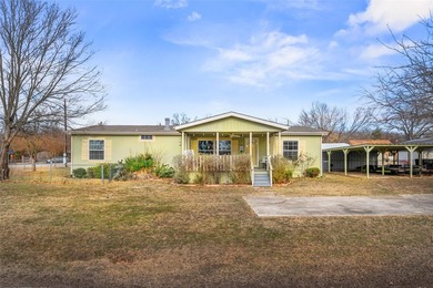 Zero down payment eligible home. Enjoy tranquil lake living in - photo 2