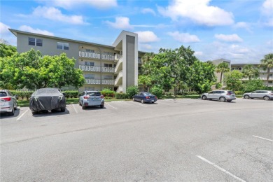 Lake Condo For Sale in Coconut Creek, Florida