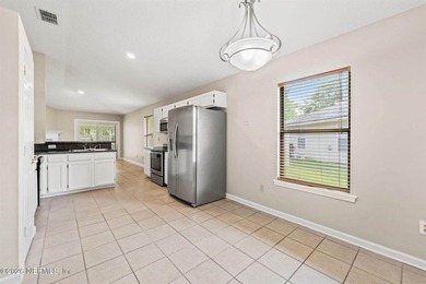 Welcome home to Bay Harbor! This spacious 4 bedroom, 2 bath - photo 11