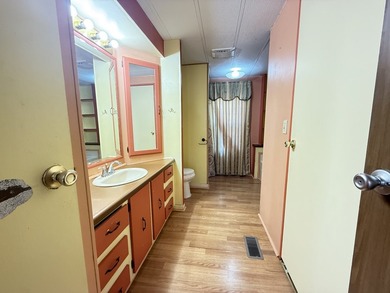 Charming 3-bedroom, 2-bathroom home located in the welcoming - photo 12
