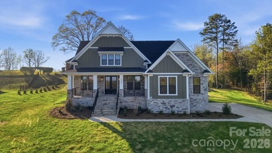 Step into a home that truly has it all, perfectly nestled in the - photo 1
