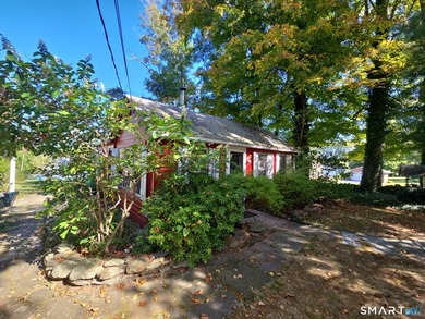 Truly an original; this one bedroom lake bungalow is as cute as - photo 3