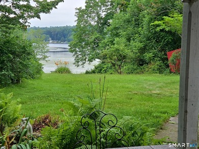 Truly an original; this one bedroom lake bungalow is as cute as - photo 4