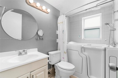 Desirable 1st floor- corner unit (only one neighbor) with