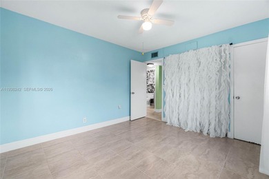 Desirable 1st floor- corner unit (only one neighbor) with