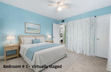 Desirable 1st floor- corner unit (only one neighbor) with