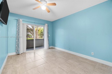 Desirable 1st floor- corner unit (only one neighbor) with