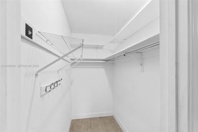 Desirable 1st floor- corner unit (only one neighbor) with