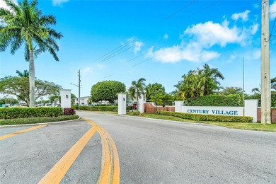 Desirable 1st floor- corner unit (only one neighbor) with