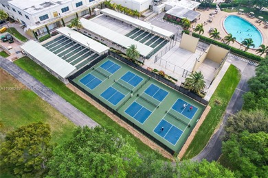 Desirable 1st floor- corner unit (only one neighbor) with