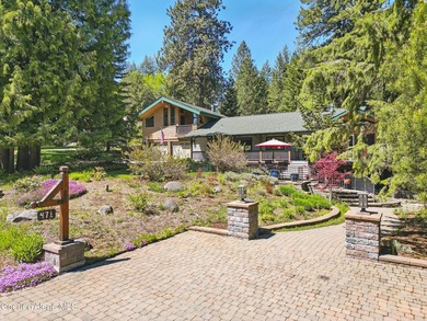 Welcome to this stunning North Idaho retreat in the coveted - photo 1
