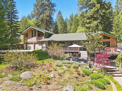 Welcome to this stunning North Idaho retreat in the coveted - photo 2