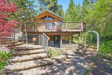 Welcome to this stunning North Idaho retreat in the coveted - photo 3