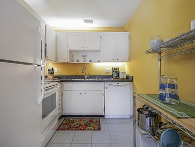 Charming one-bedroom, 1.5 bath condo located in the desirable - photo 21